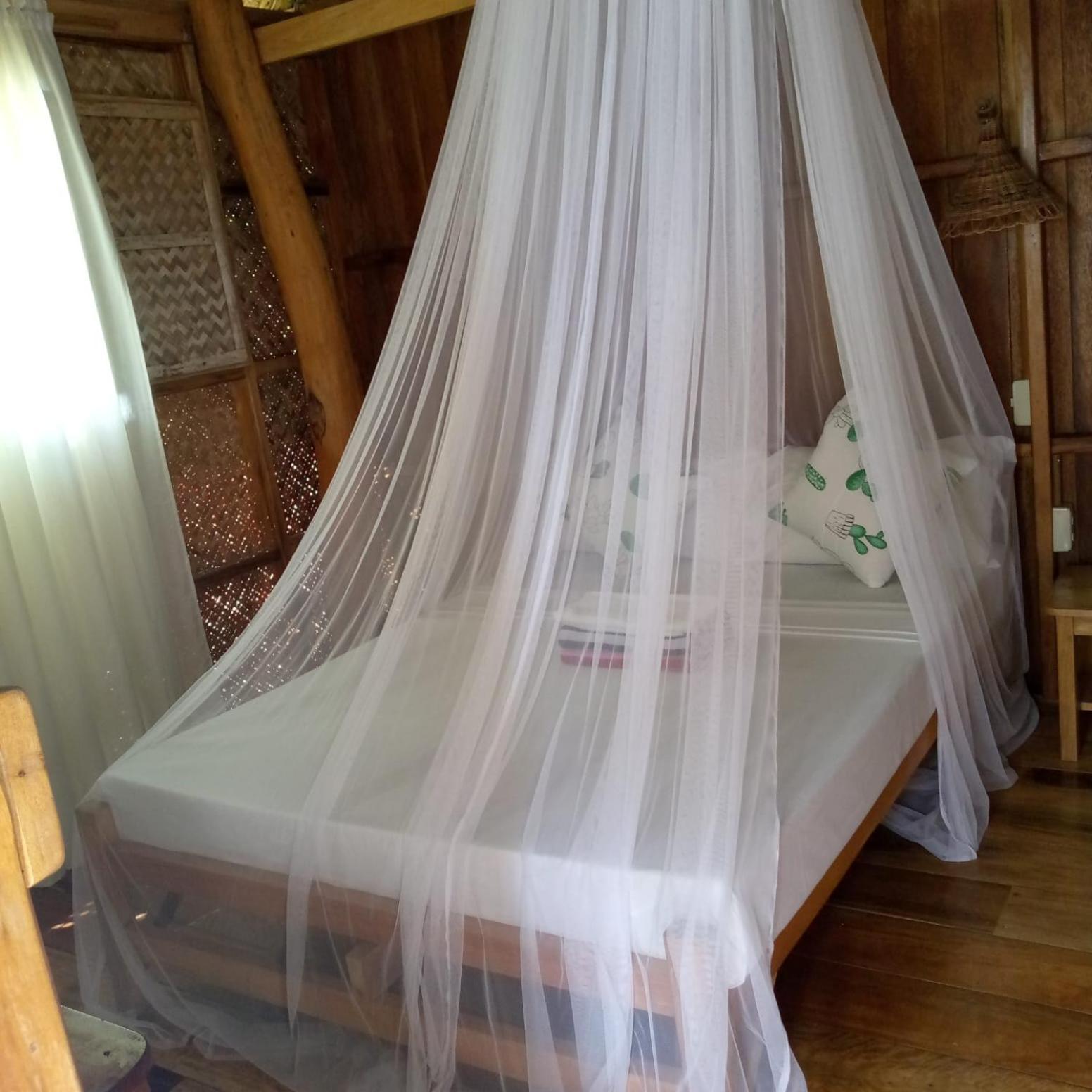 Tinaoog Beach Resort Alad Buitenkant foto
